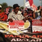 aksi-damai-di-depan-istana-papua-setia-pada-merah-putih-ug1Fw3zyNB